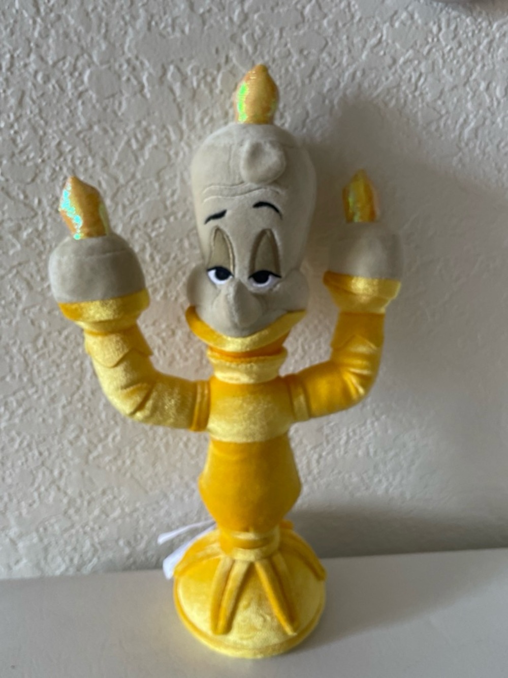 Disney Lumiere plush doll.